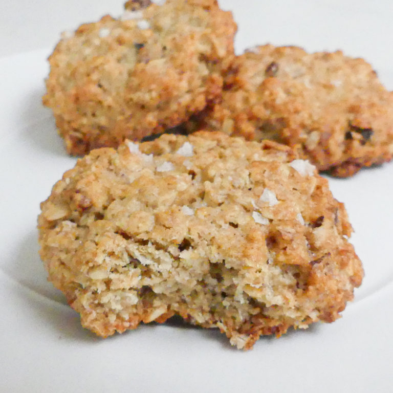 Oatmeal Cookie, Oatmeal Raisin cookie with a bite taken out of it