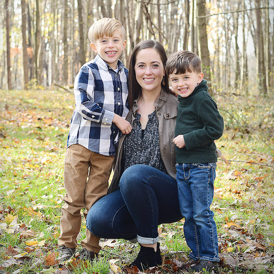 Mom with two boys in the woods