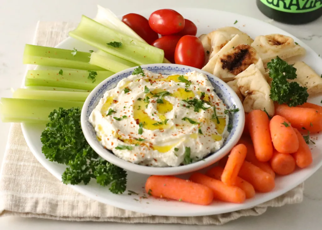 whipped feta with vegetables and pita wedges