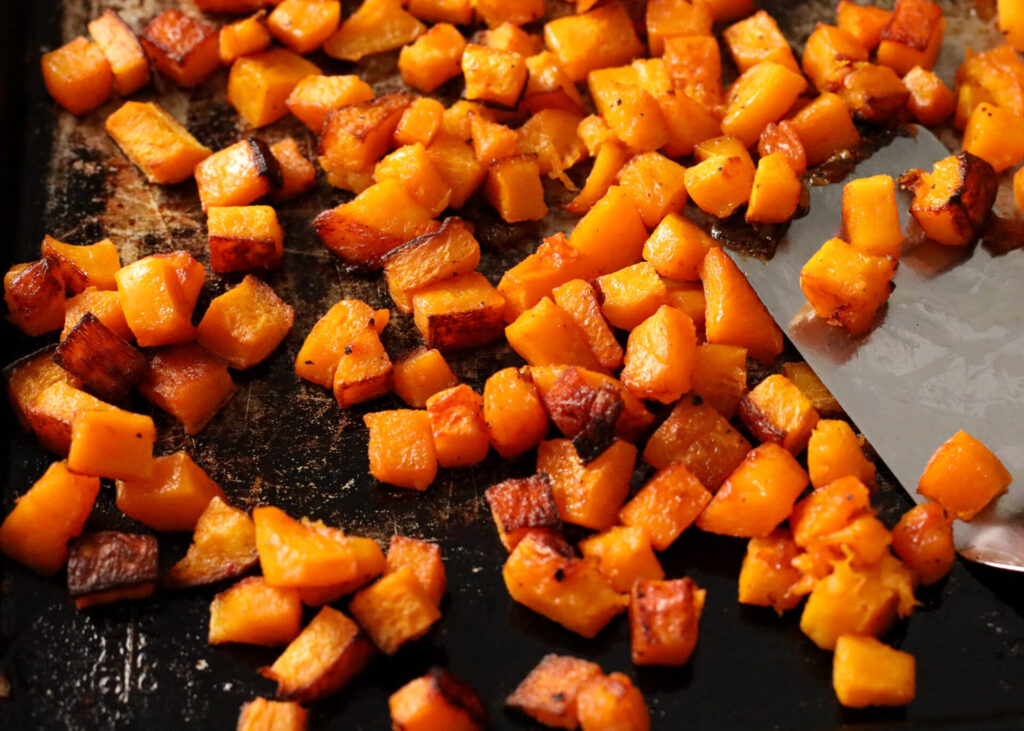 roasted butternut squash on a sheet pan
